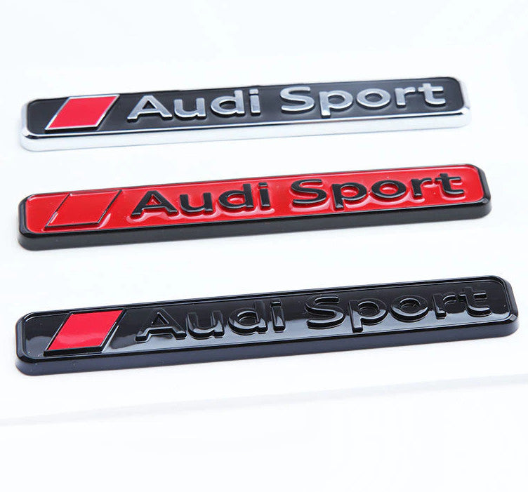 Carbon-plated side fender and window badge decals for Volvo XC40 cars.