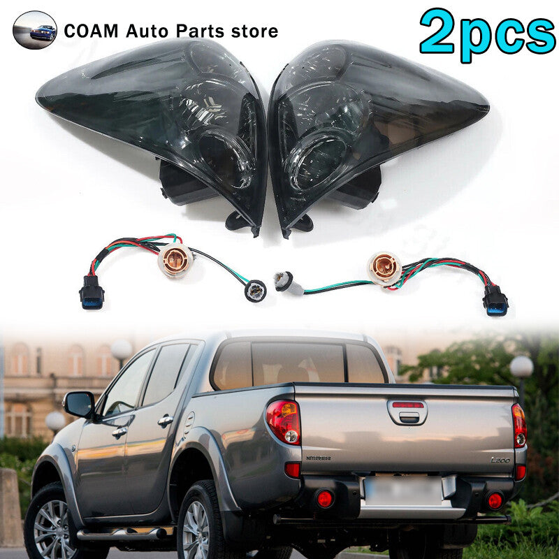 A pair of Triton Colt pickups for Mitsubishi L200 2005-2016 taillights and rear brake lights.