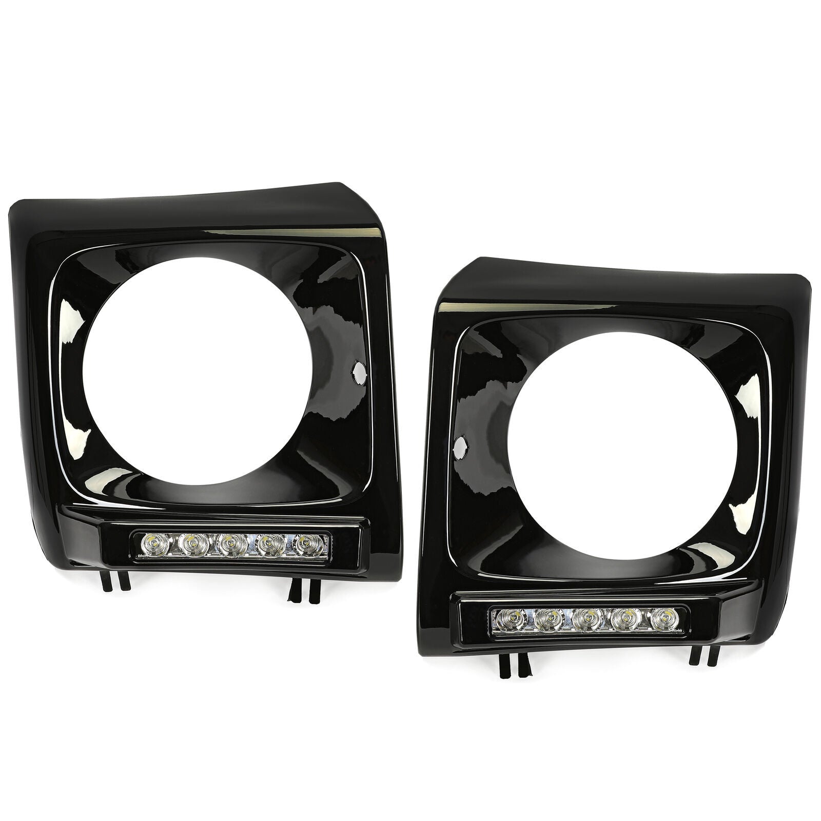 pair of black headlight bezels for the 1990-2018 for Mercedes W463 G63 Wagon G500 with LED DRLs.