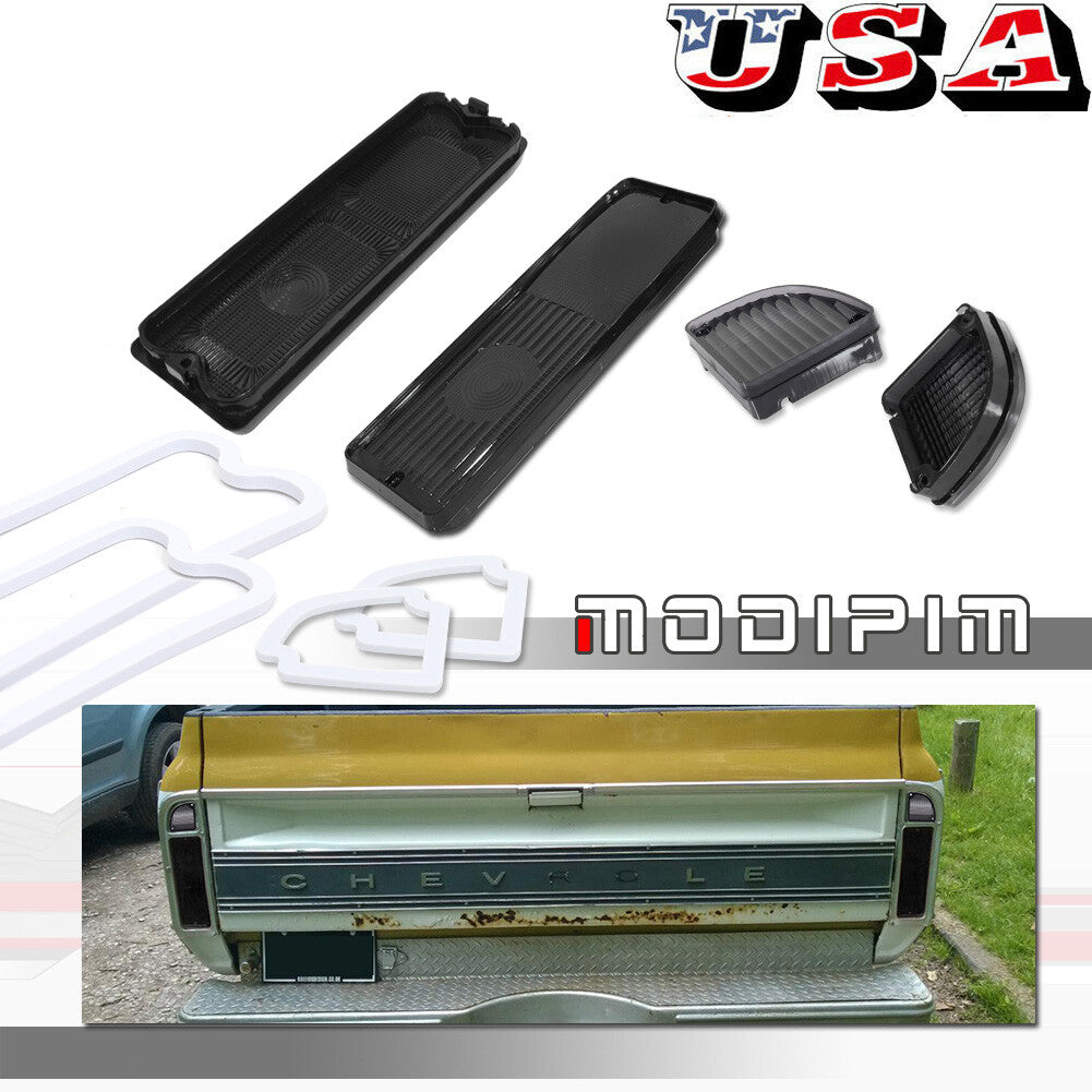 A pair of smoked pickup truck taillight housings with gaskets, suitable for 1967-1972 for Chevrolet and Gimsi trucks.