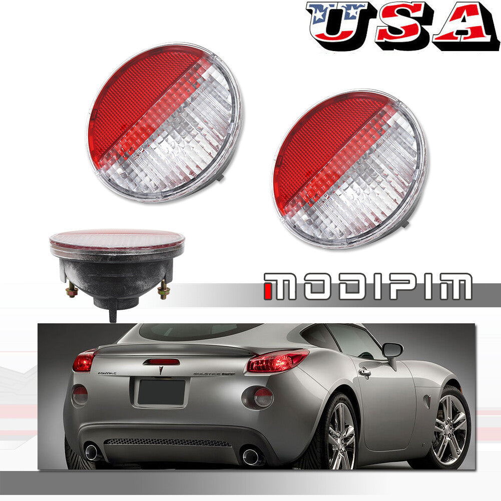 pair of transparent red lens side-reverse backup lights suitable for 02-09 Envoy and 06-09 Solstice.
