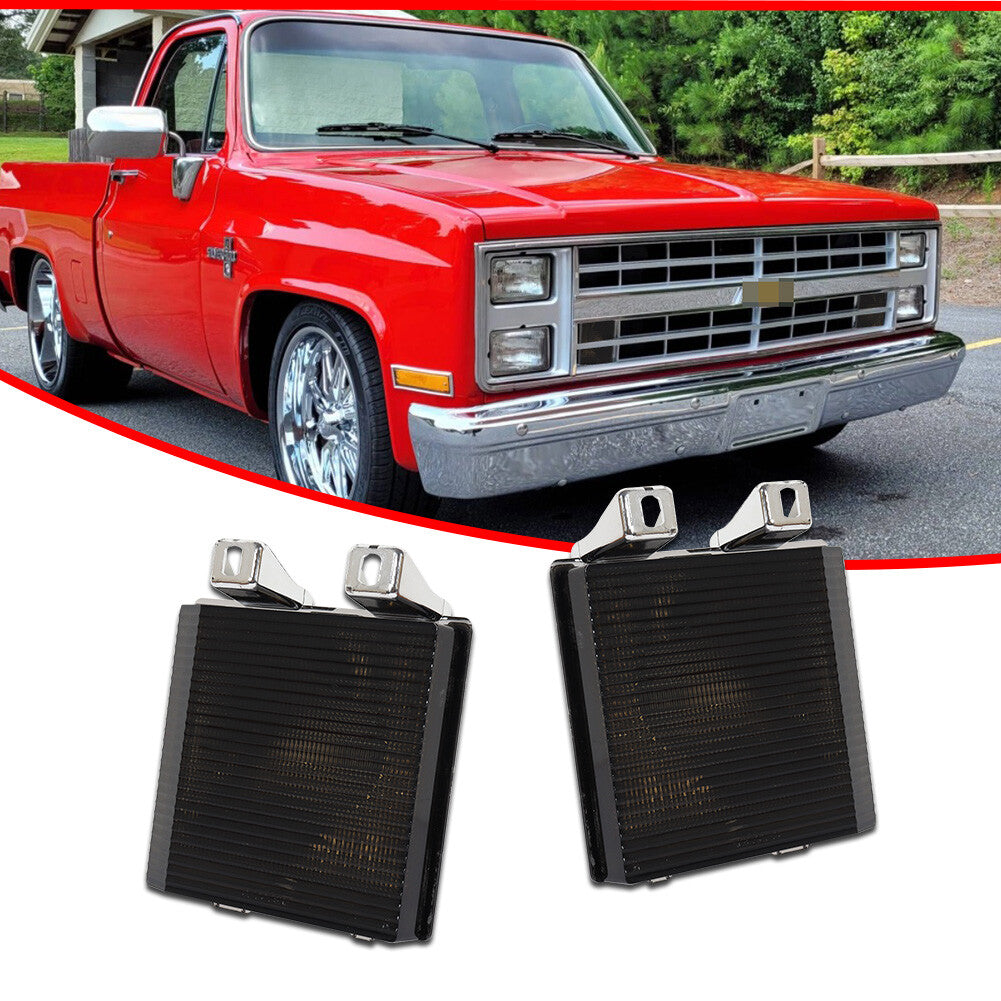 A pair of smoke turn signal side corner marker lights for Chevrolet for GMC pickup trucks