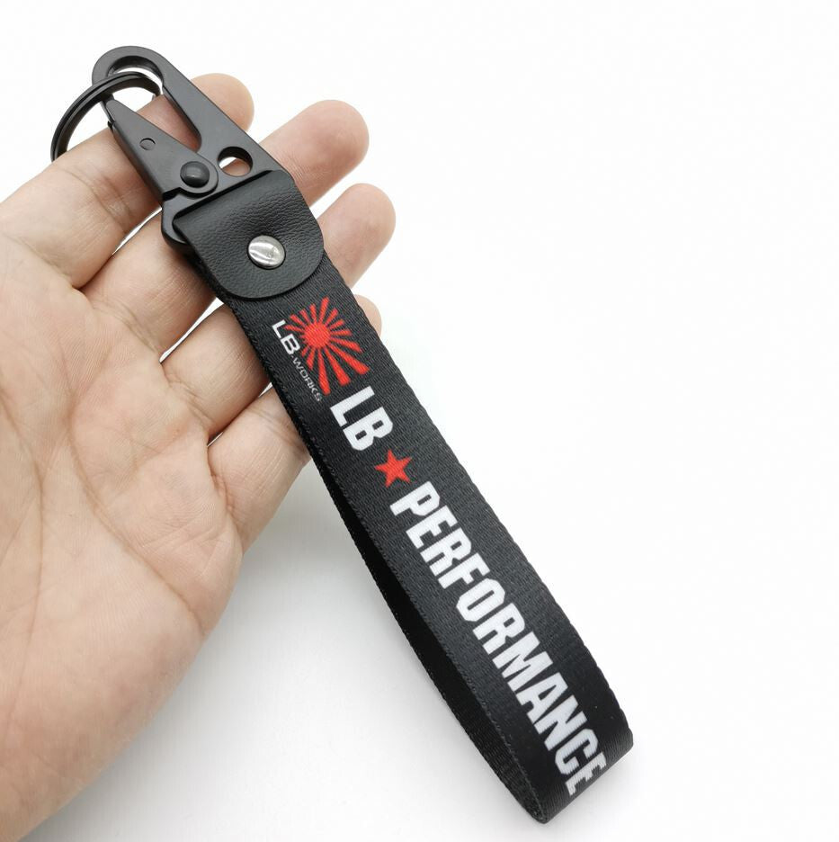 1 car key ring/key chain with lanyard, black, suitable for Mitsubishi .