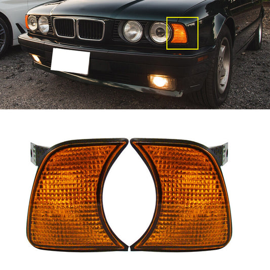 A pair of amber corner lights/turn indicator lights for BMW 5 Series E34 1989-1995.
