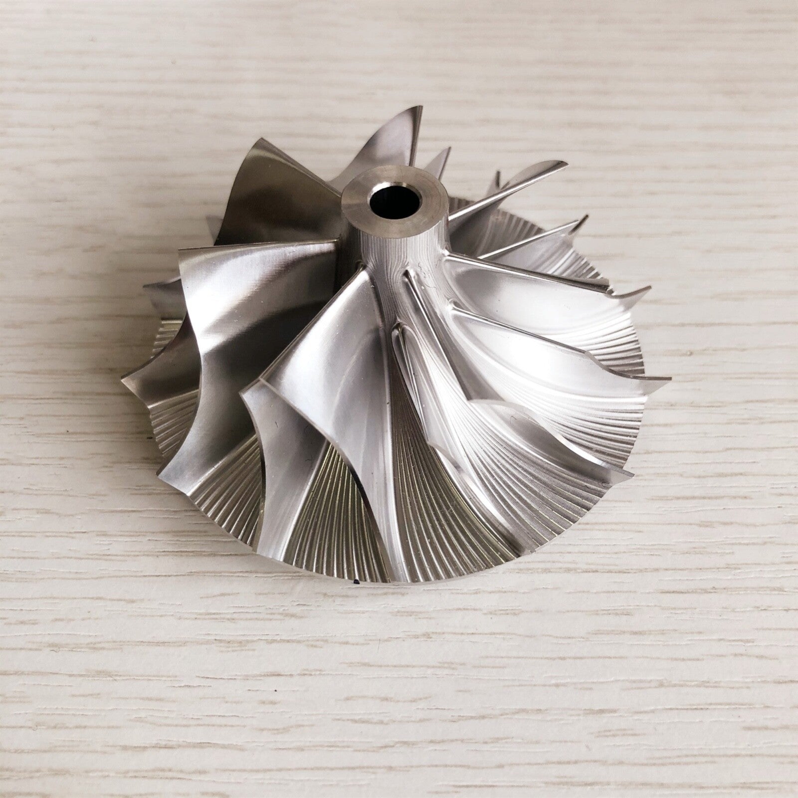 T04S 409535-0007 57.10/76.07mm 7+7blades Performance billet compressor wheel