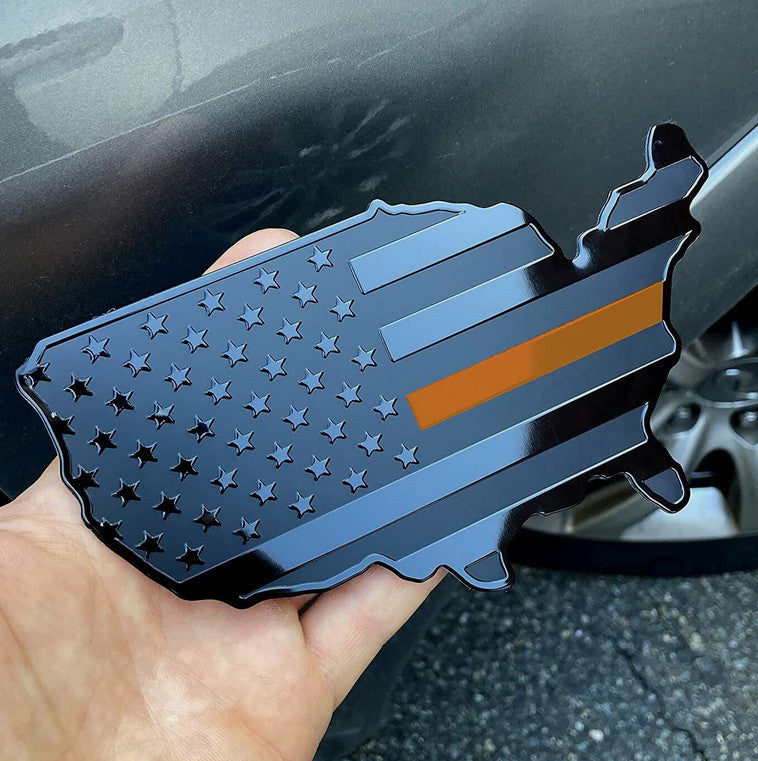 Black and orange American flag map badge on the back of the car side fender for Chevrolet