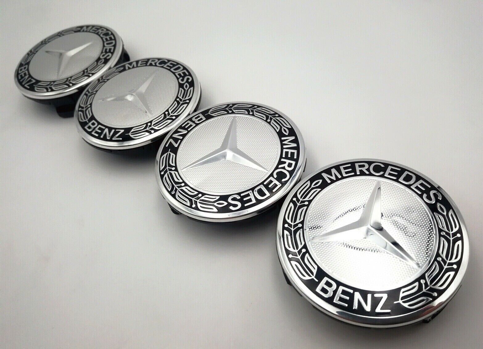 4 sets of 75mm wheel center caps and hubcaps for Mercedes-Benz AMG black rims.