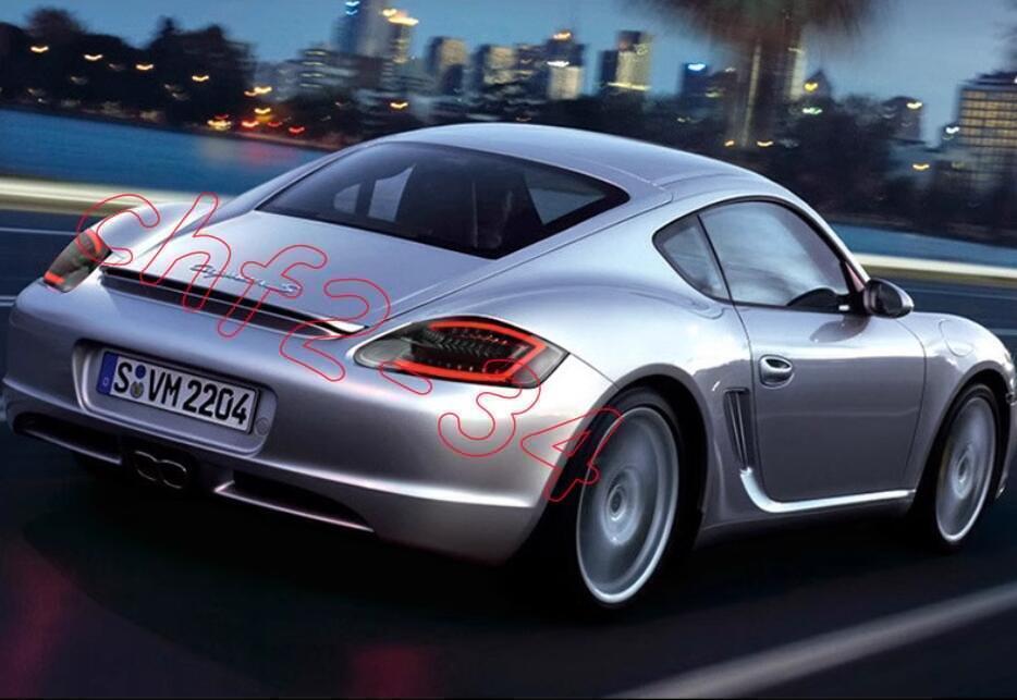 A pair of smoked LED taillight assemblies for Porsche Cayman 987.1 2004 - 2008.