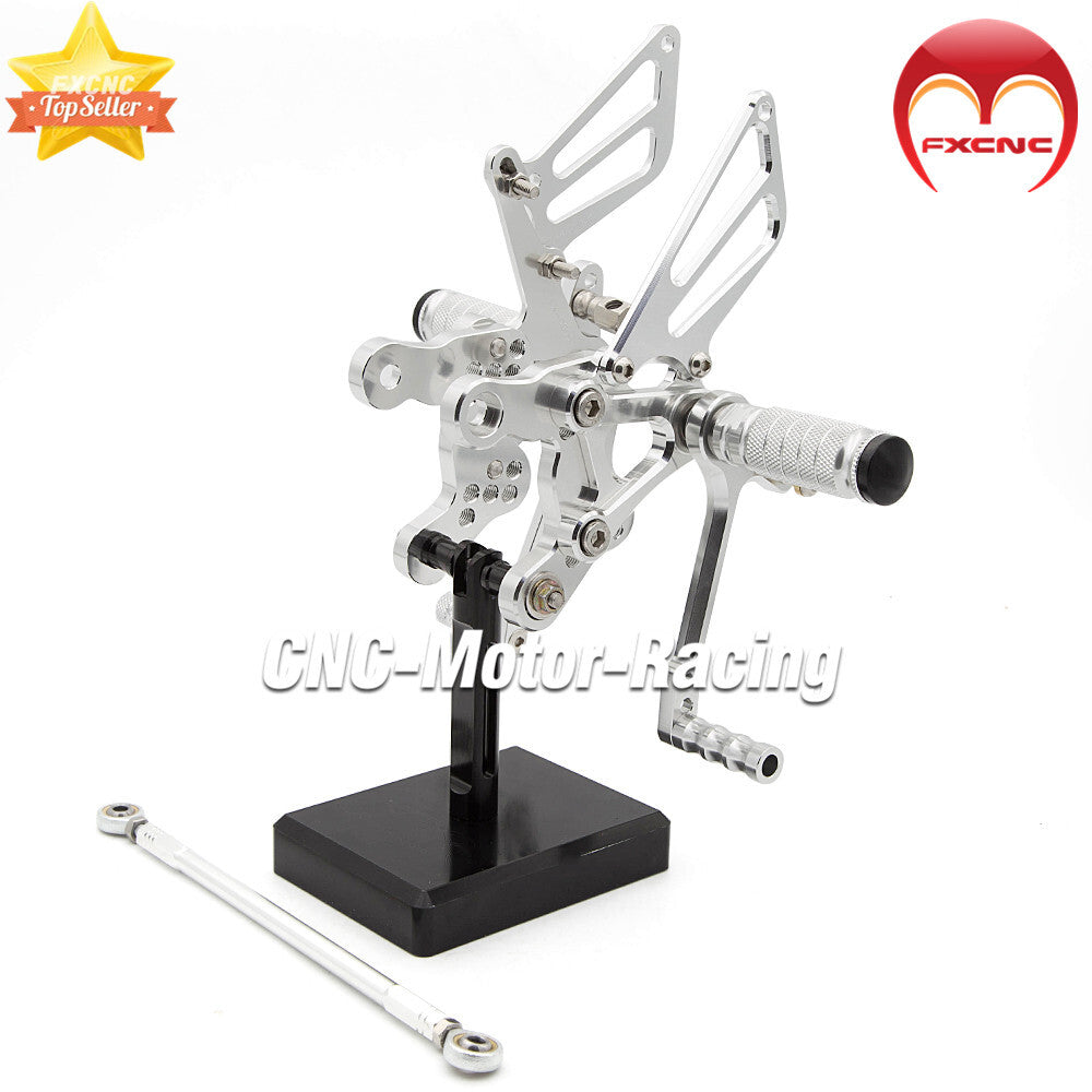 CNC-controlled foot spikes, gears, and footrest pedals are suitable for CBR919RR (1996-1999) and CBR400RR (1993-1999).